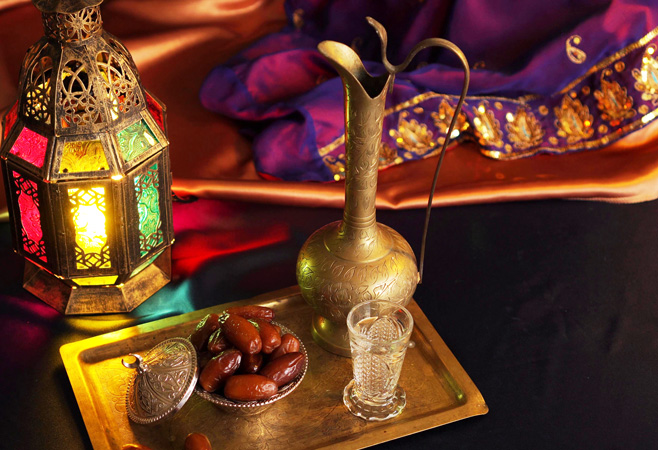 Eid al-Adha Islamic holiday. Feast of the Sacrifice. Kurban Bayram. Festive table with coffee and traditional Oriental sweets