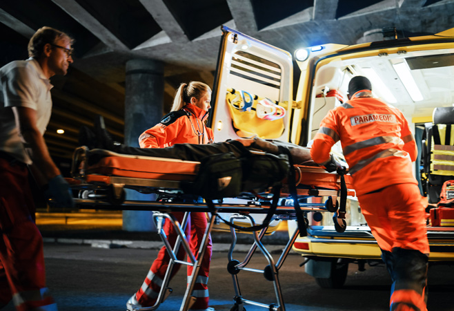 Team of EMS Paramedics React Quick to Provide Medical Help to Injured Patient