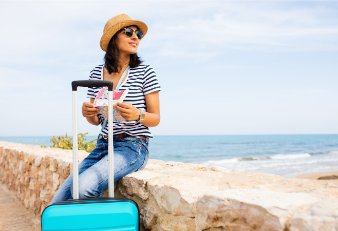 A young Indian woman is traveling to Kuwait